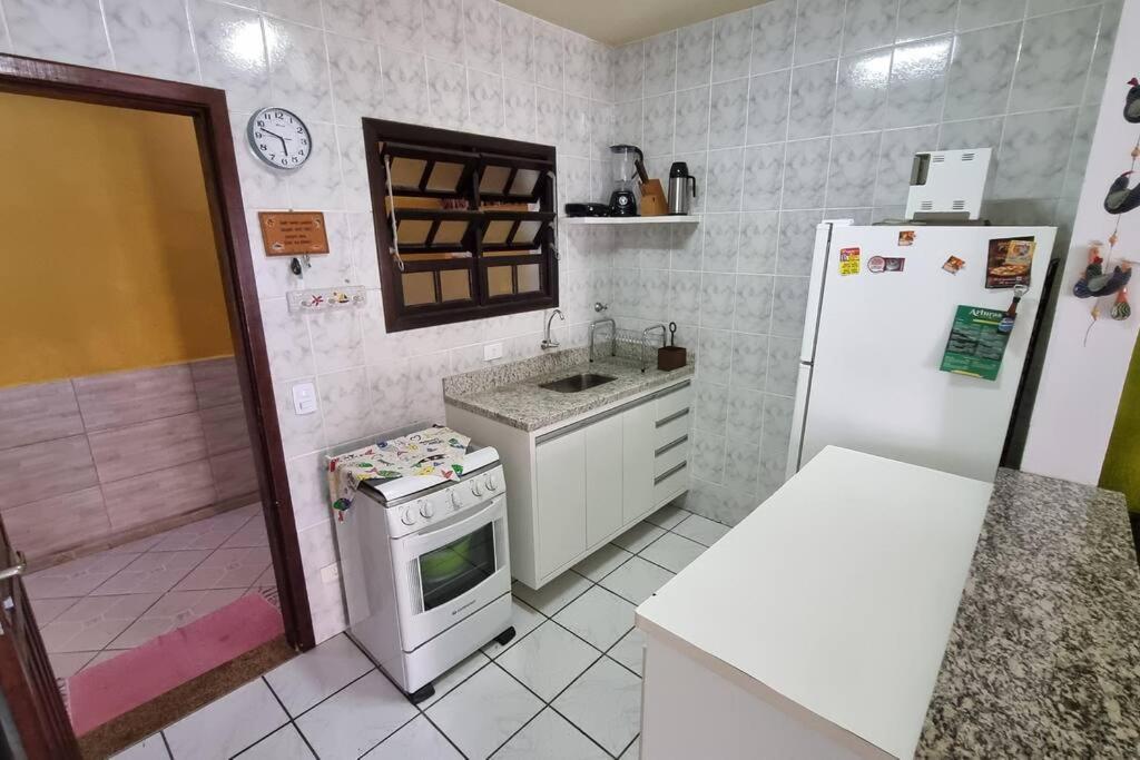 Casa confortável perto da praia Martim de Sá