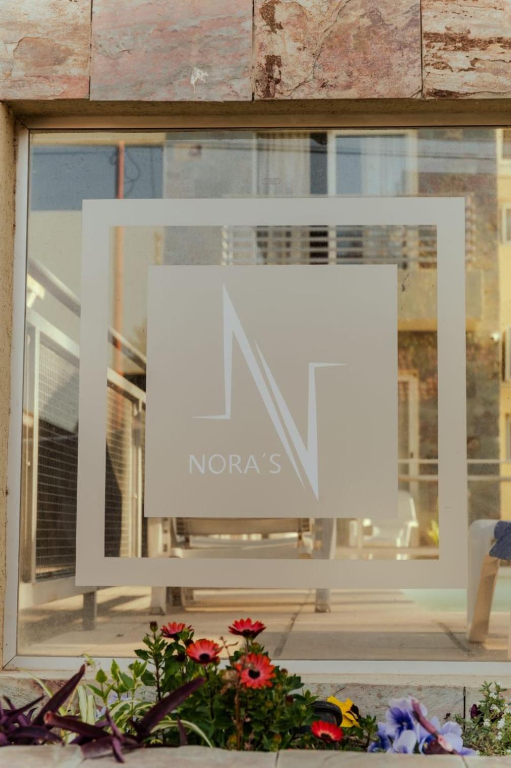 Nora's Complejo