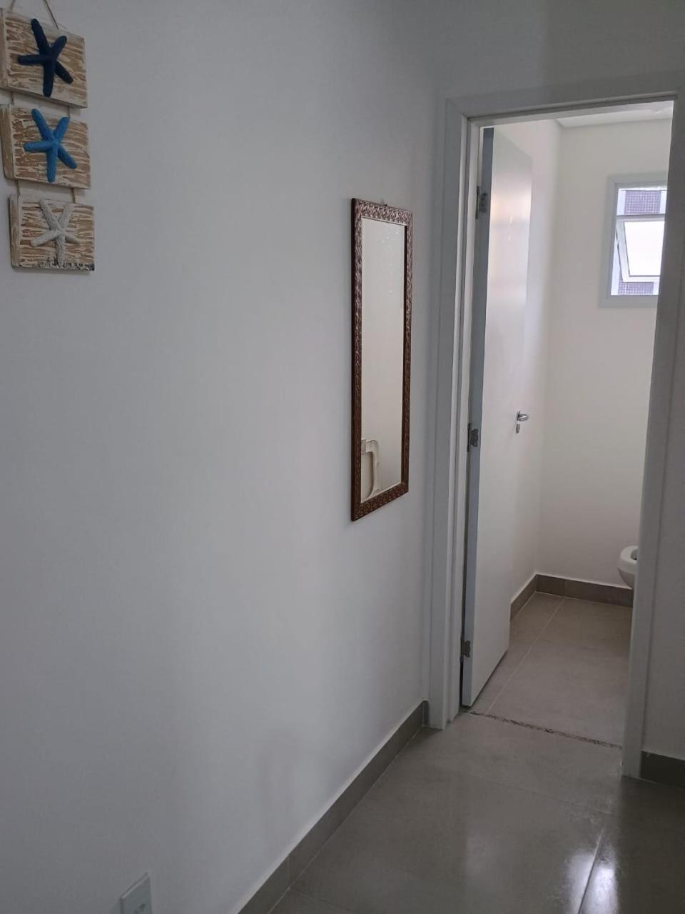Apartamento 25 de 1 quarto aconchegante PRAIA GRANDE recém construido