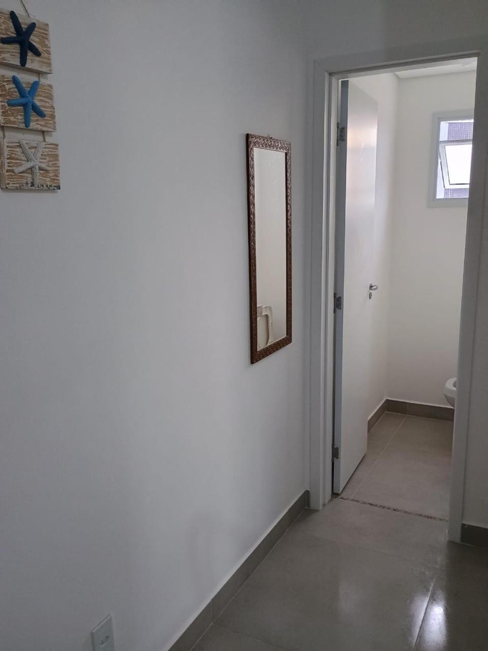 Apartamento 25 de 1 quarto aconchegante PRAIA GRANDE recém construido