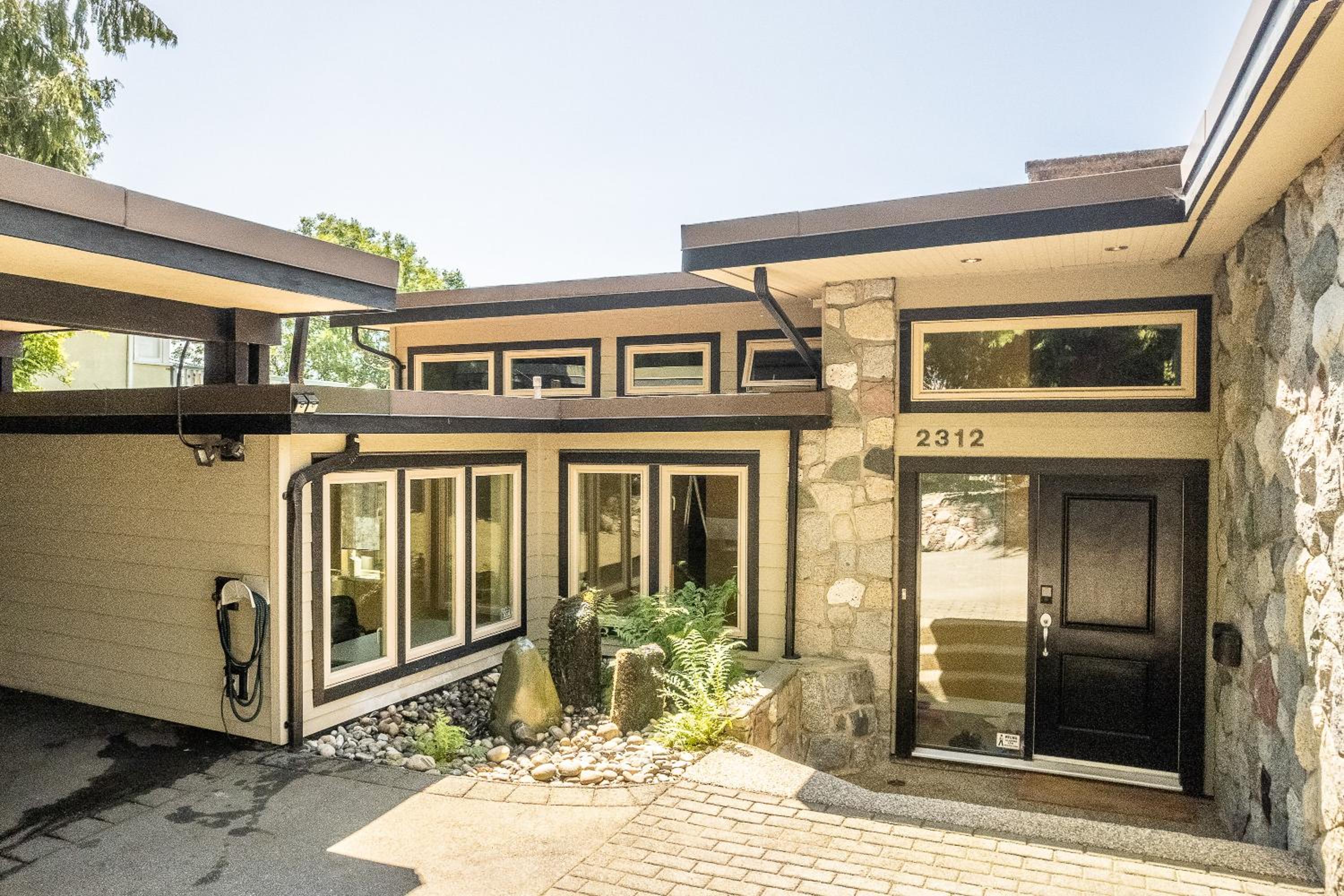 West Vancouver Family Home w Custom Patio and Pool