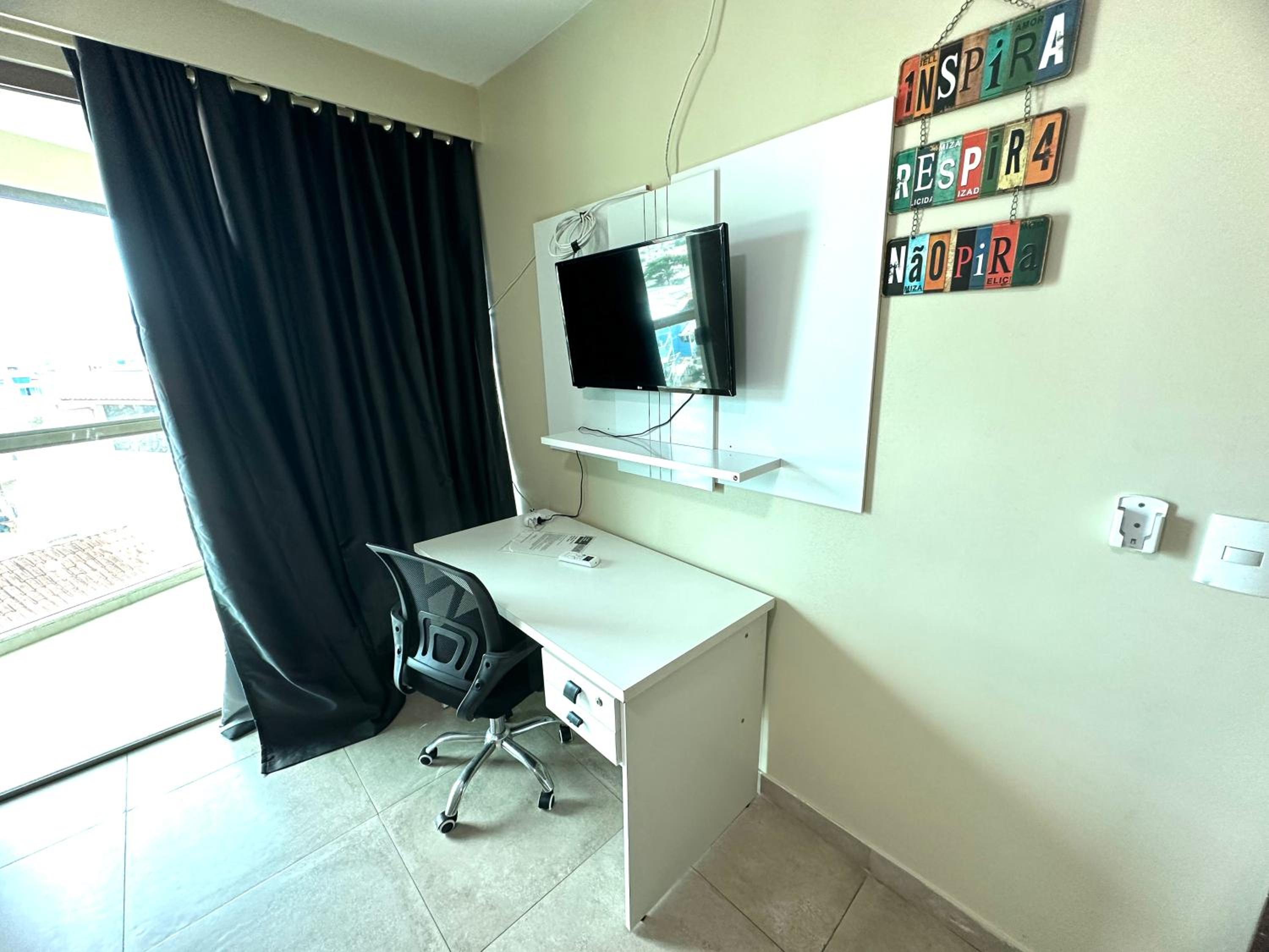 Apartamento com 2 quartos até 7 Pessoas- Orla da Praia Grande