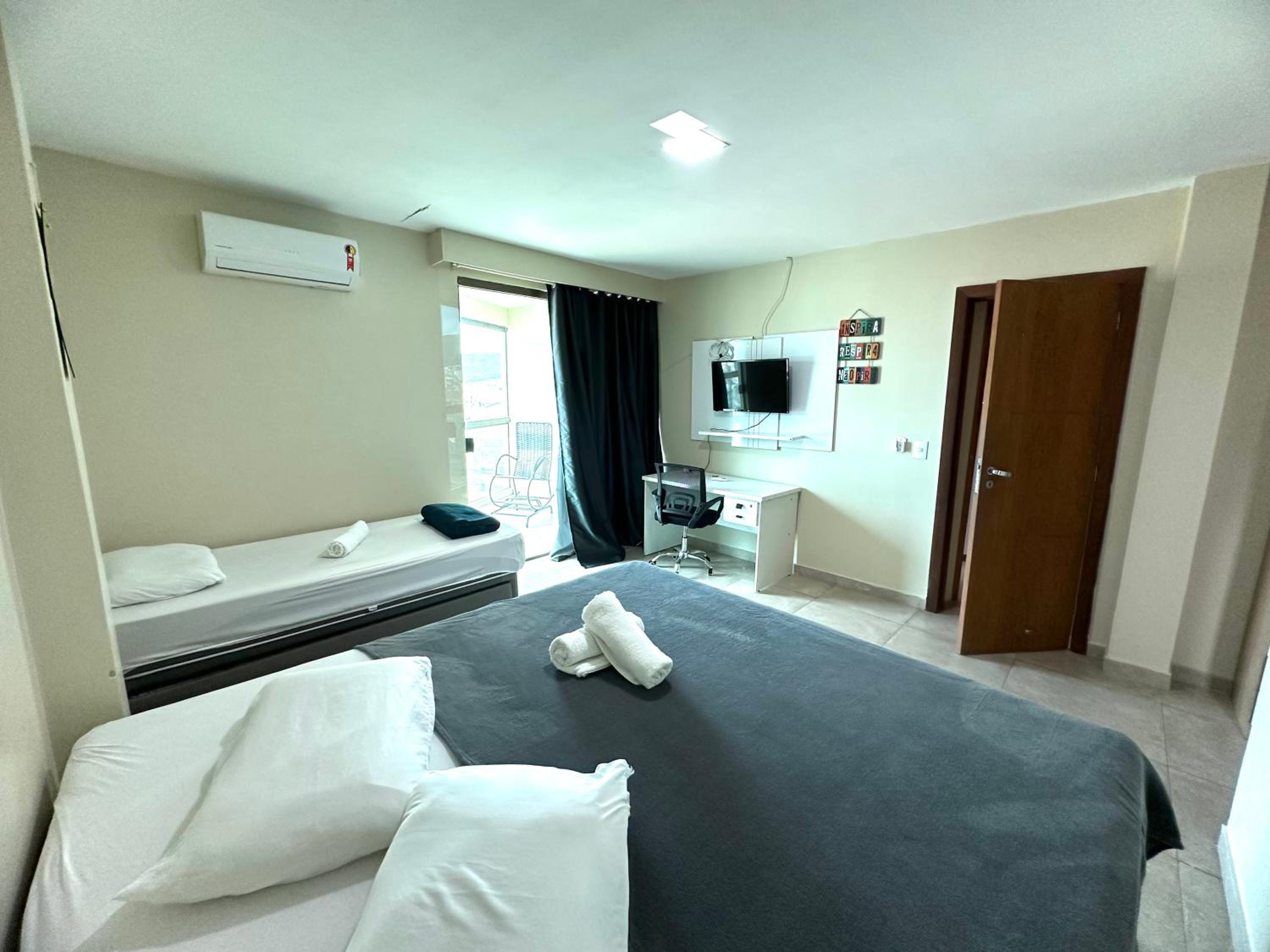 Apartamento com 2 quartos até 7 Pessoas- Orla da Praia Grande