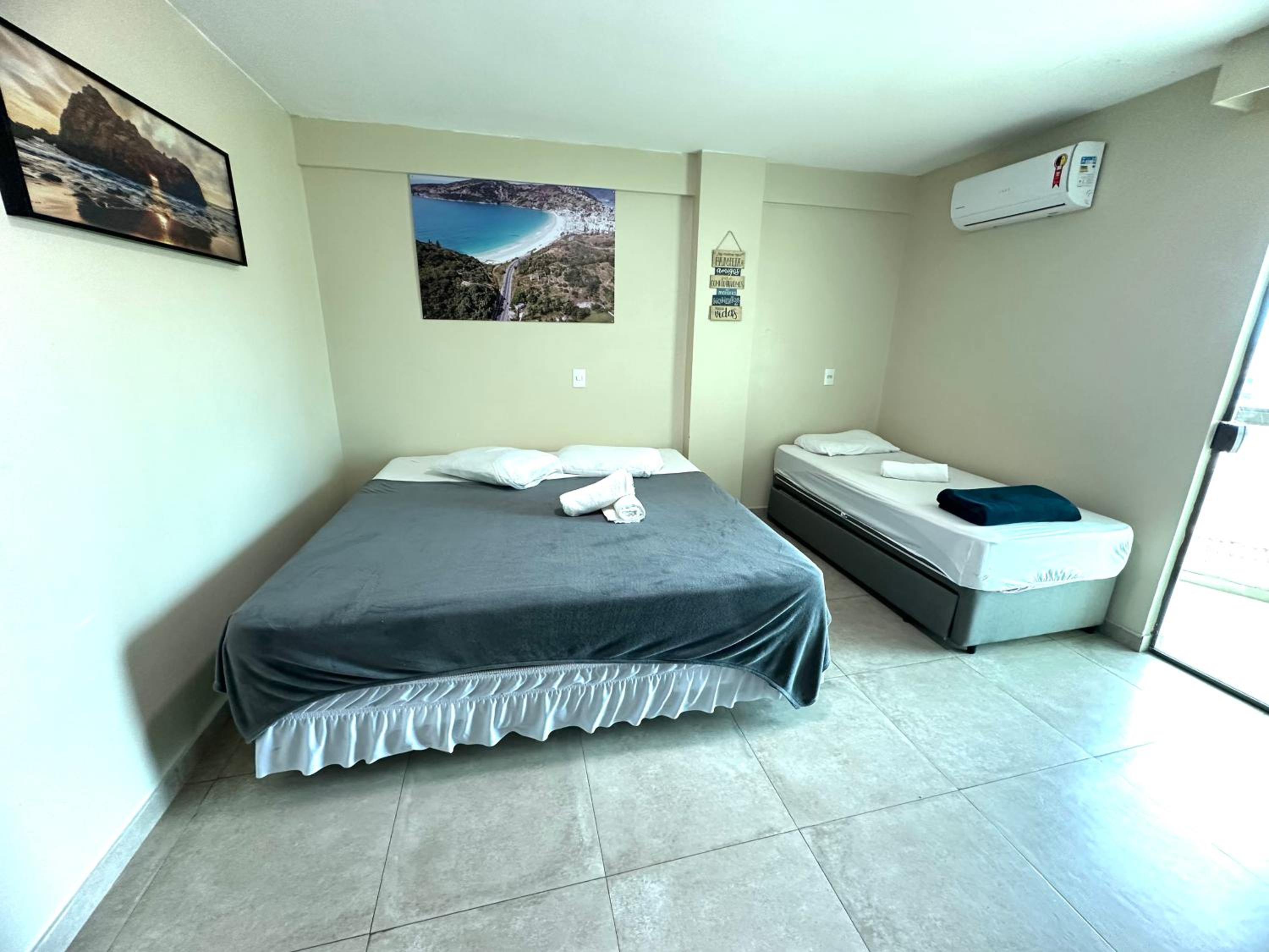 Apartamento com 2 quartos até 7 Pessoas- Orla da Praia Grande