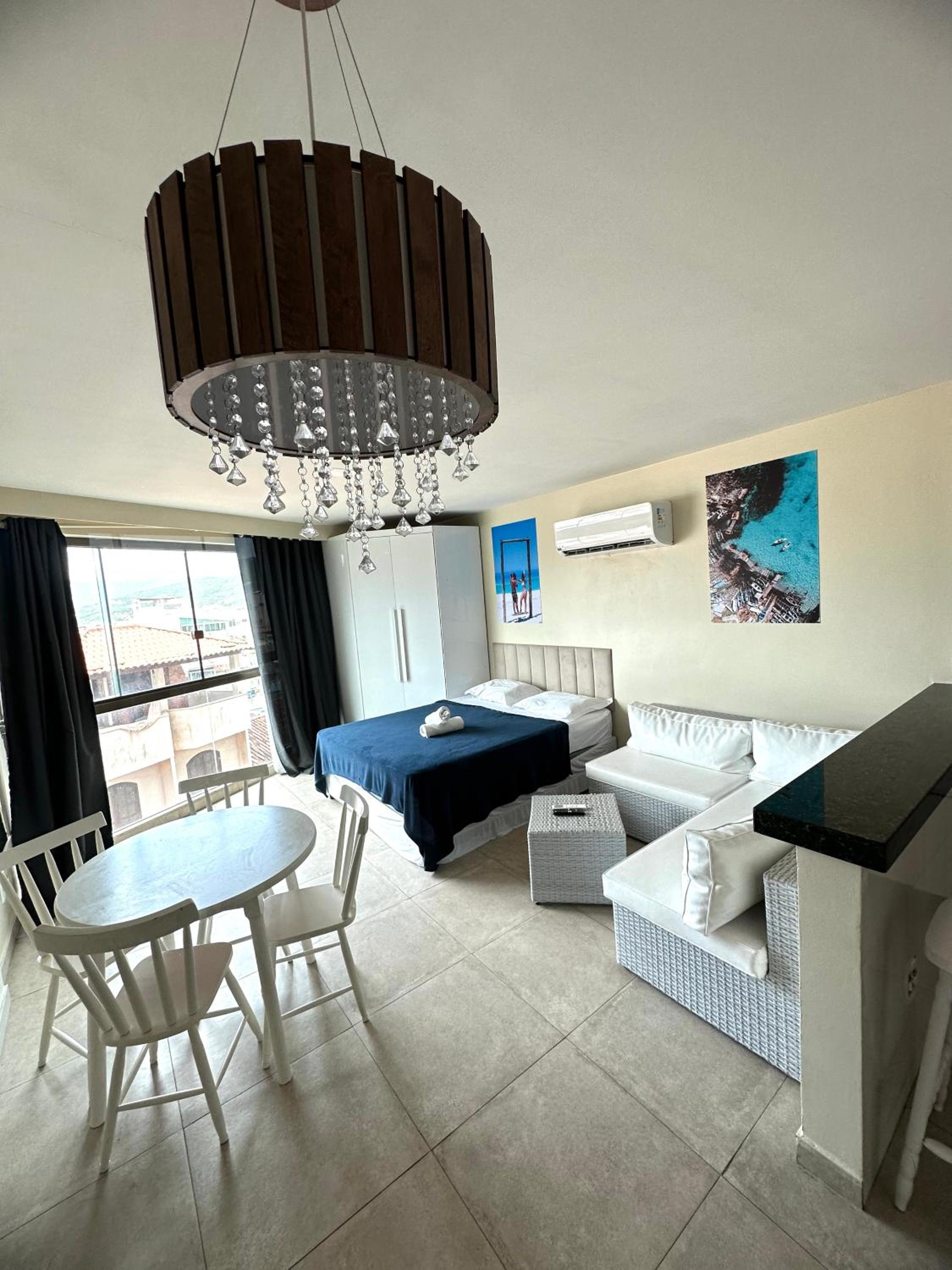 Apartamento com 2 quartos até 7 Pessoas- Orla da Praia Grande
