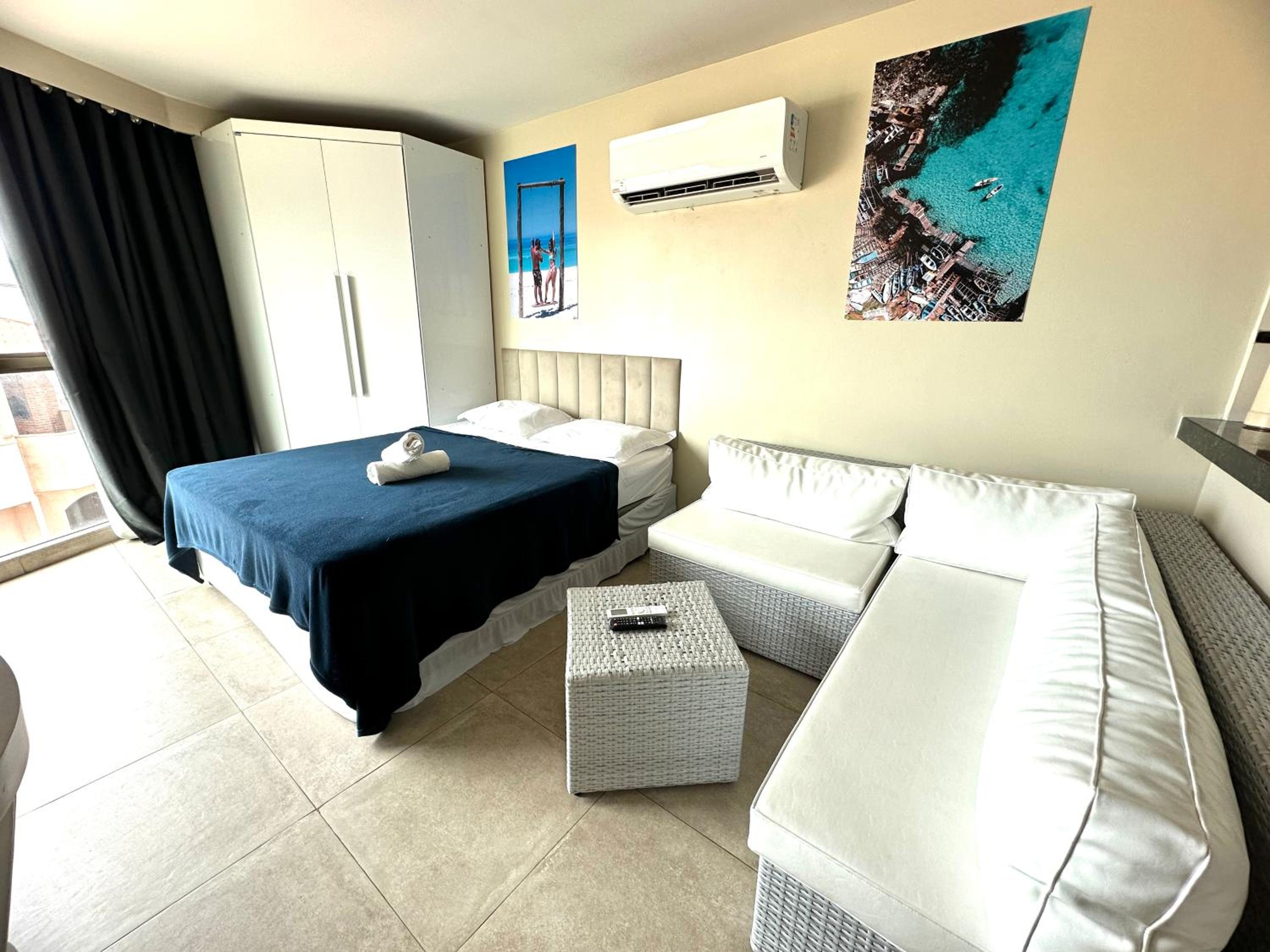 Apartamento com 2 quartos até 7 Pessoas- Orla da Praia Grande