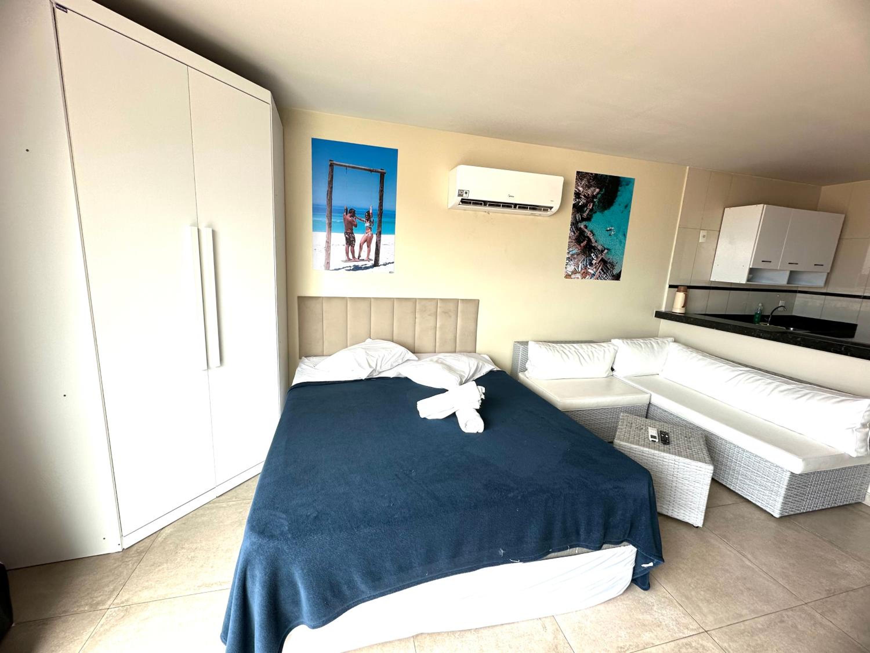 Apartamento com 2 quartos até 7 Pessoas- Orla da Praia Grande