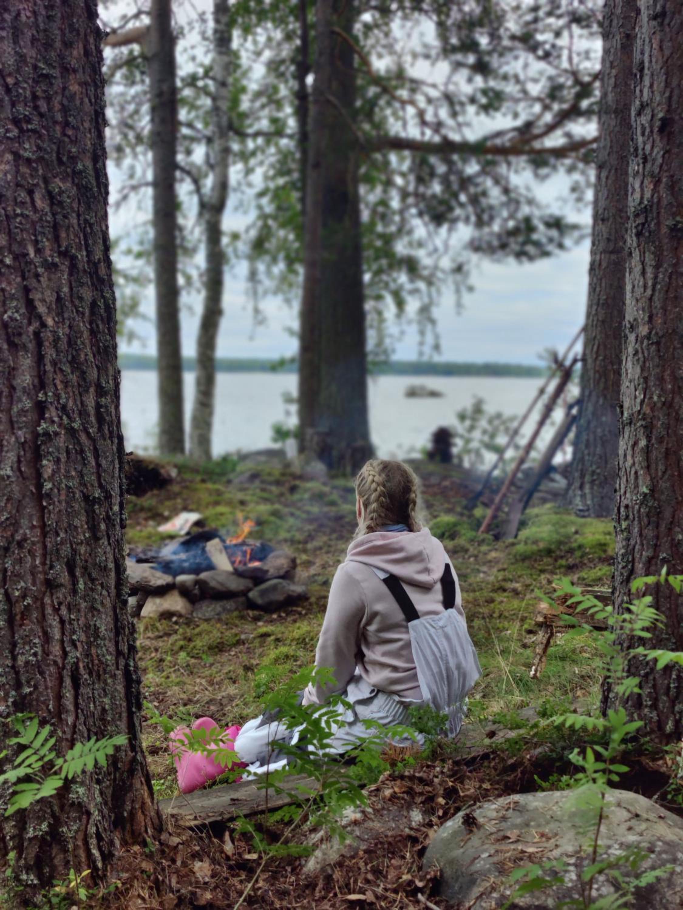 Traditional Finnish lakeside off-grid cabin
