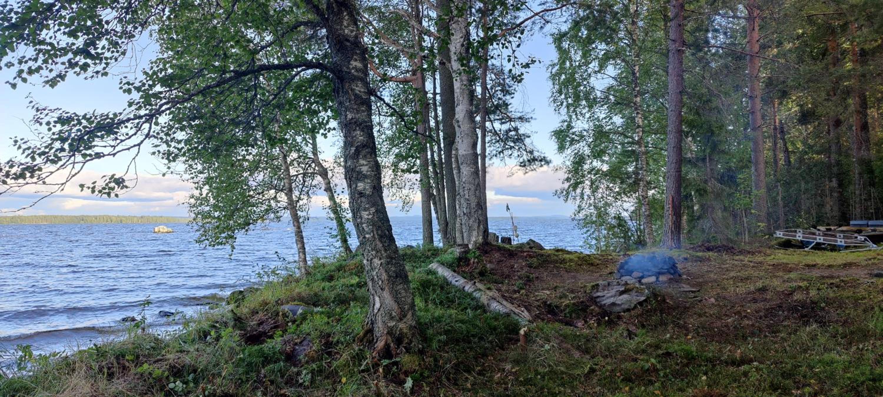 Traditional Finnish lakeside off-grid cabin
