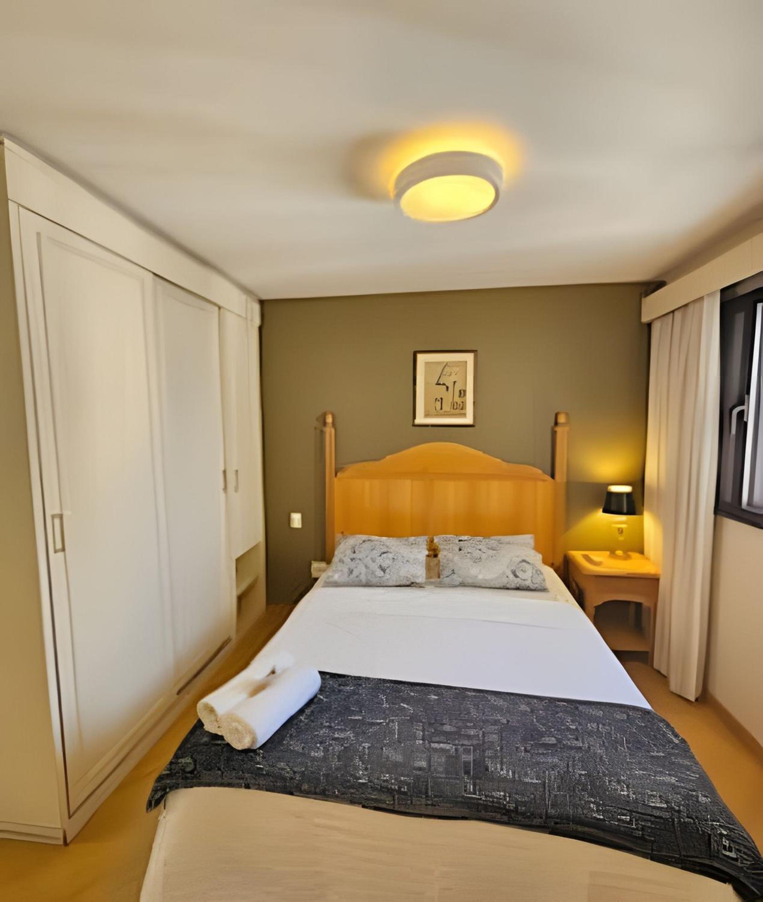 Flat-Apart hotel dois quartos c/uma suíte e vaga