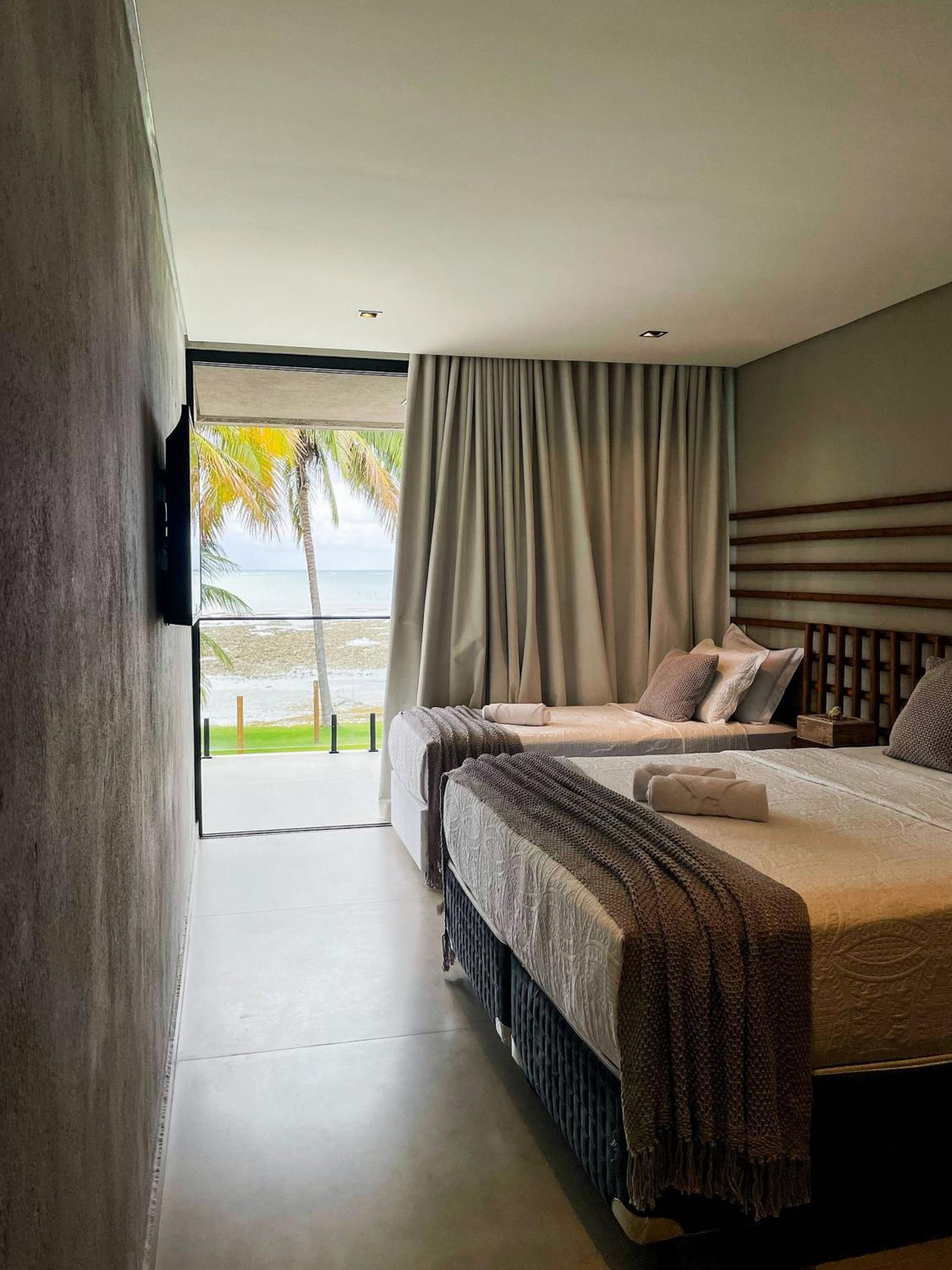 Casa Waua | PÉ NA AREIA, rooftop, borda infinita
