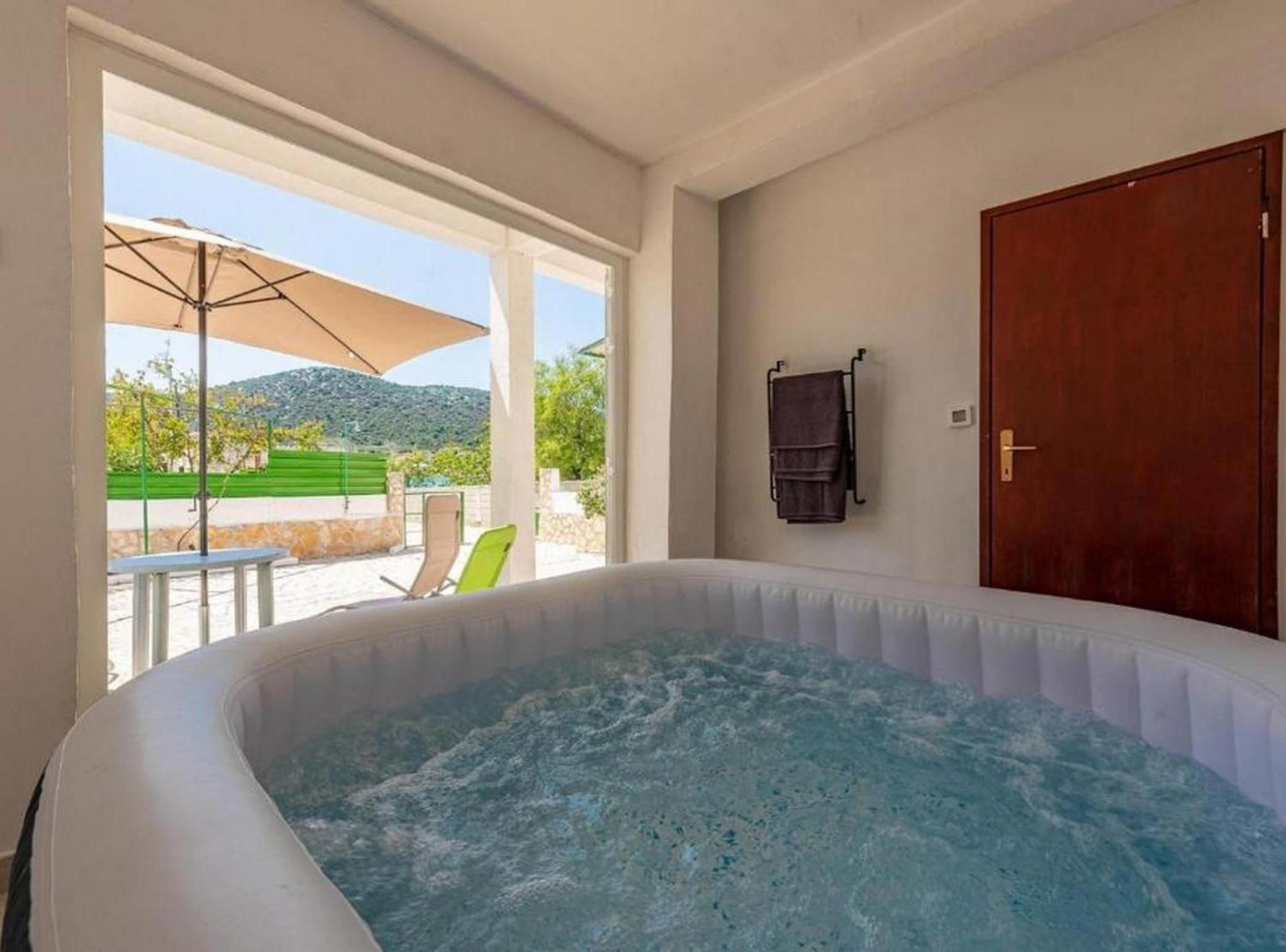 Beachfront Holiday Home with Hot Tub, Terrace, and Sea Views in Vinišće