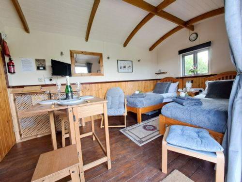 Puddleduck Hut Armathwaite with hot tub and dog agility course, perfect for a romantic break