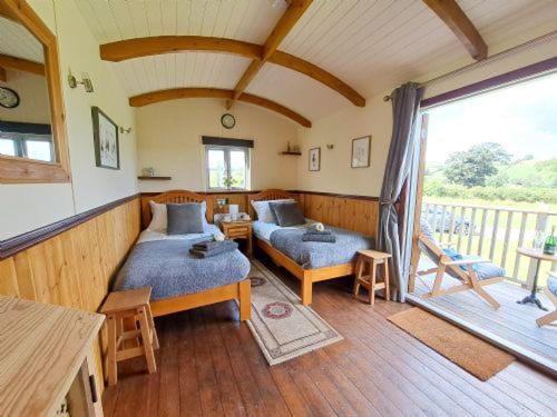 Puddleduck Hut Armathwaite with hot tub and dog agility course, perfect for a romantic break
