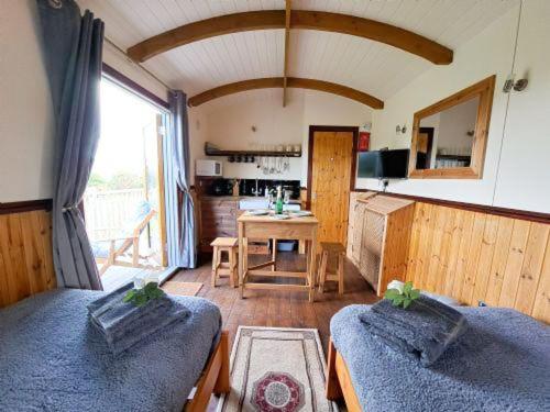 Puddleduck Hut Armathwaite with hot tub and dog agility course, perfect for a romantic break