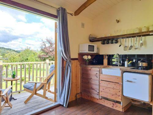 Puddleduck Hut Armathwaite with hot tub and dog agility course, perfect for a romantic break