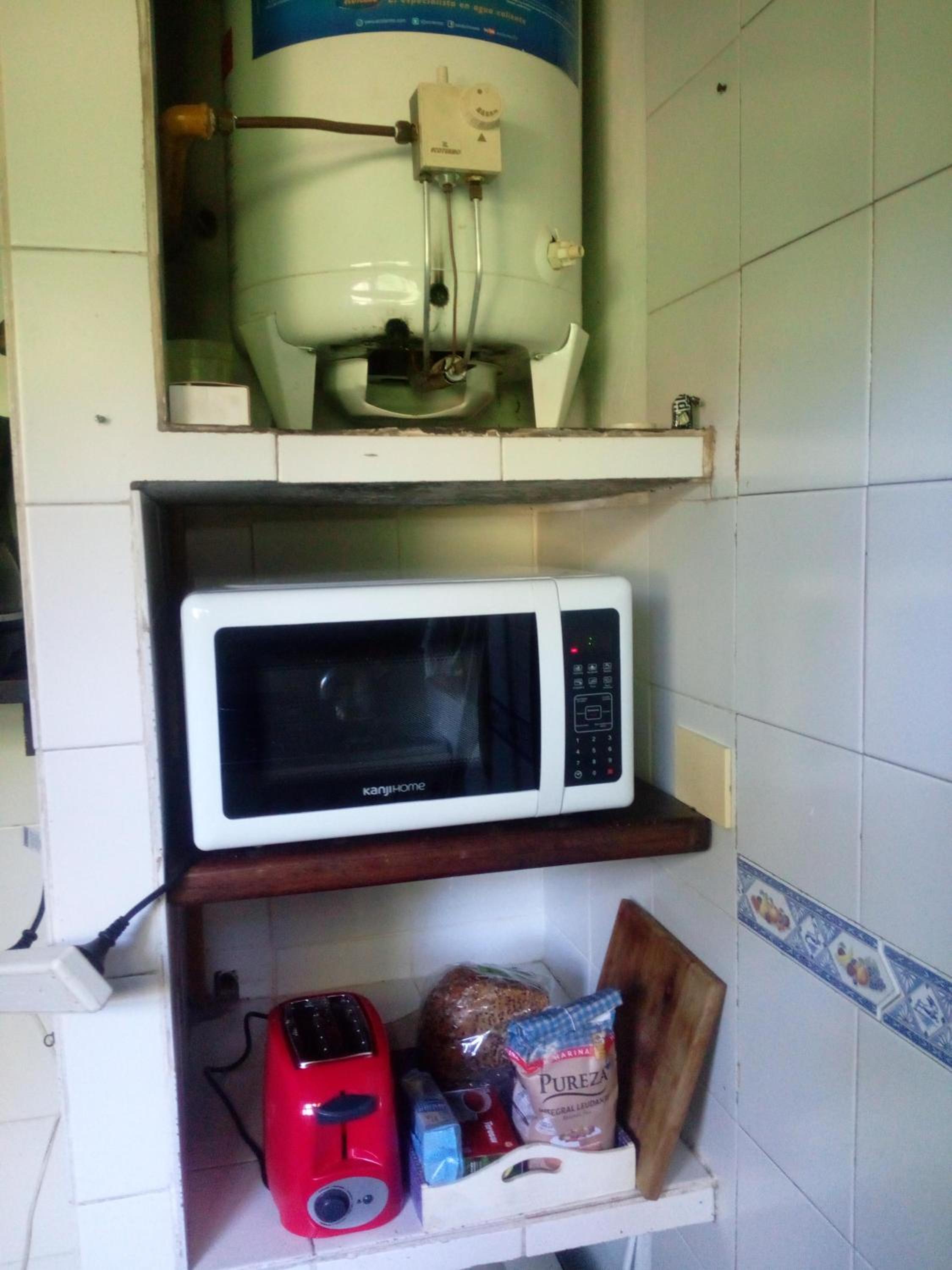 Habitación cerca del golf con baño privado en CASA COMPARTIDA