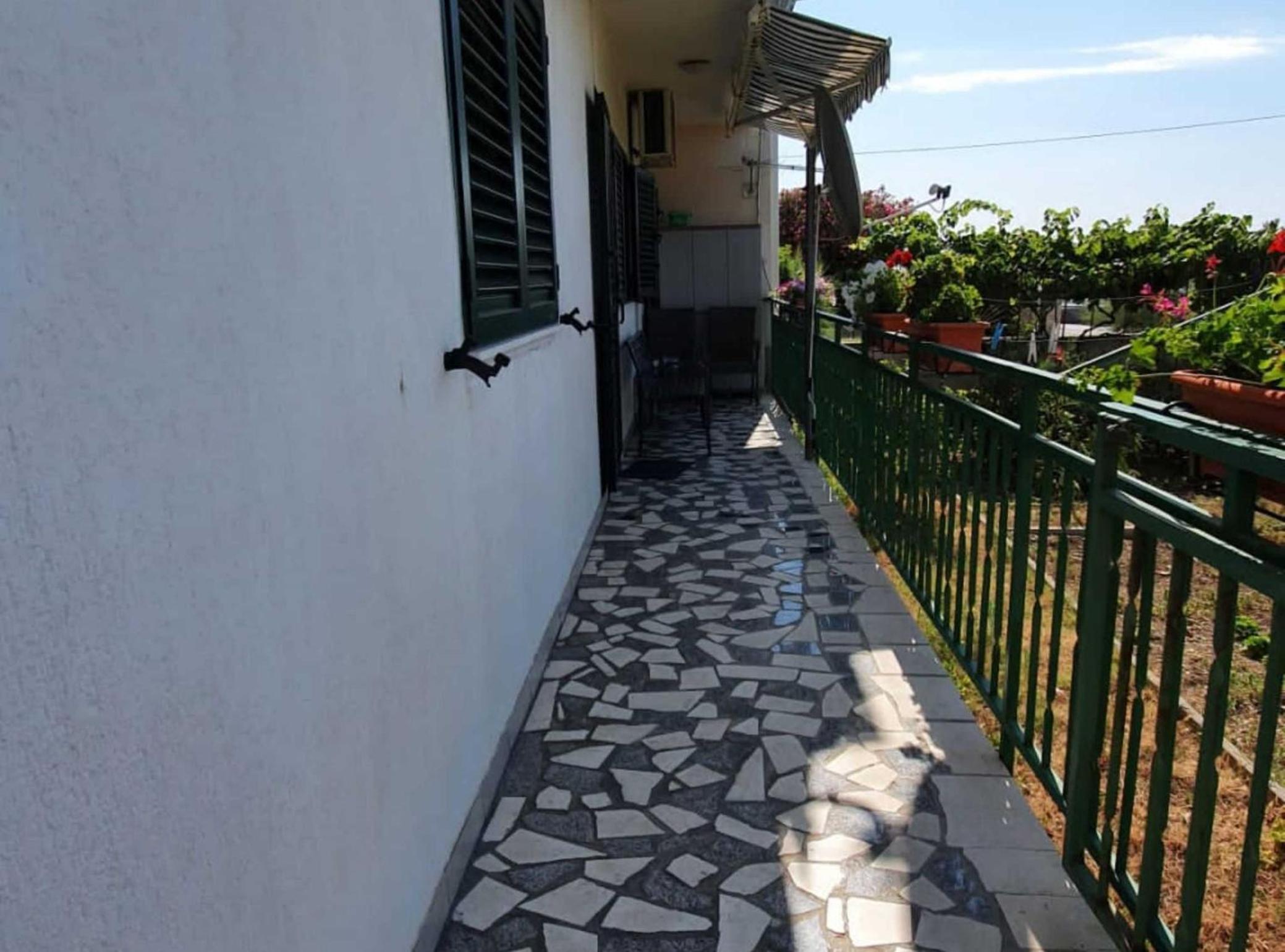 Spacious Apartment Steps from the Beach, with Private Terrace and Grill