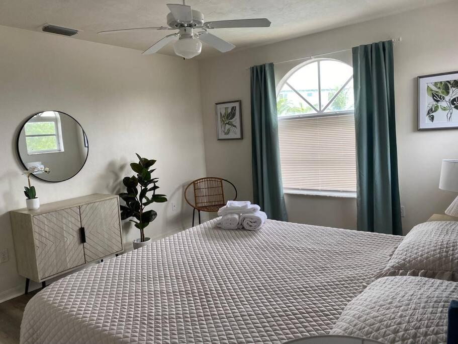 Sandy Feet Retreat - steps from the beach with pool! view 3
