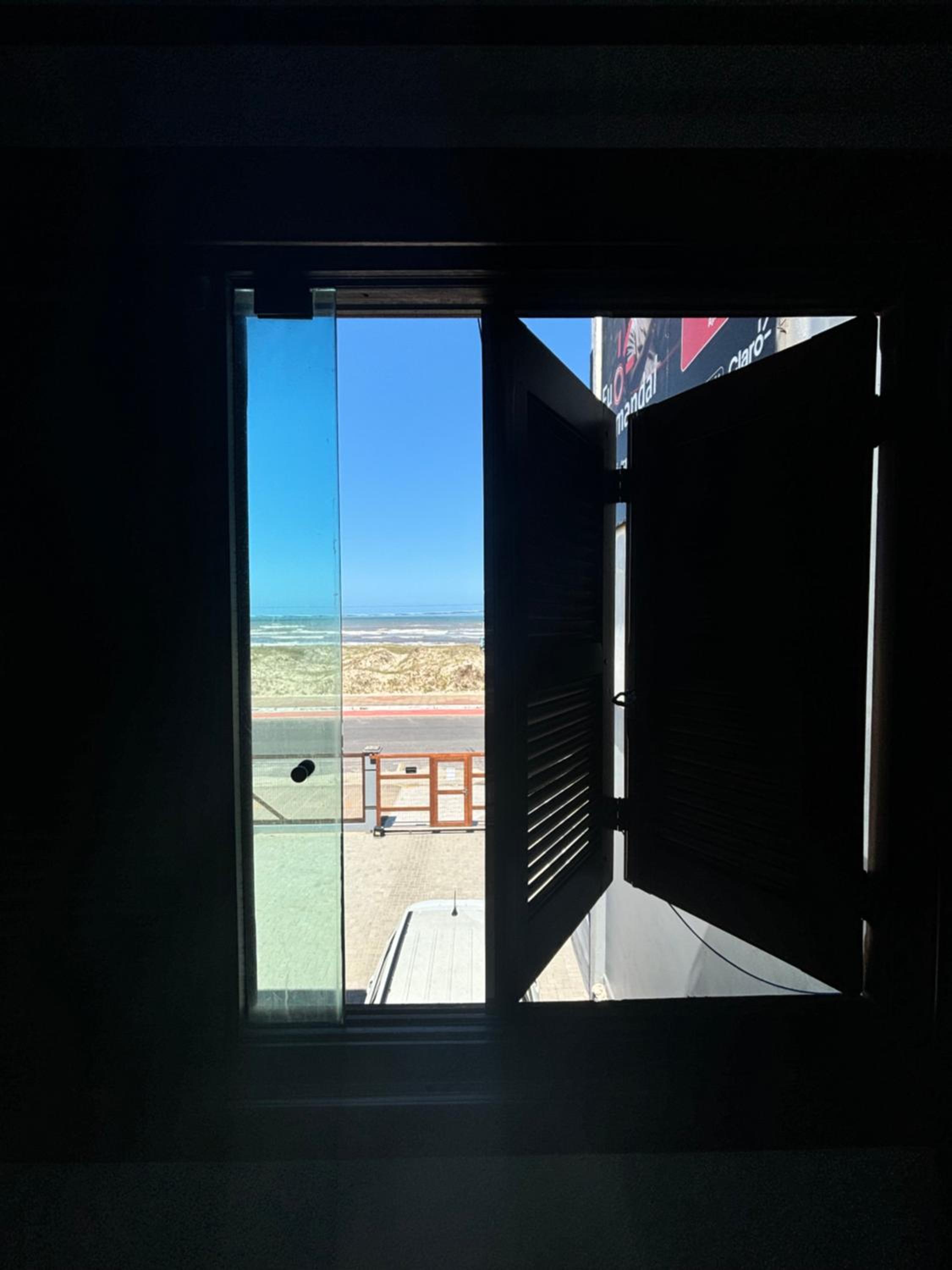 Moradas do Pier 2- apartamento a passos da areia, com vista perfeita da praia e plataforma em Tramandaí!