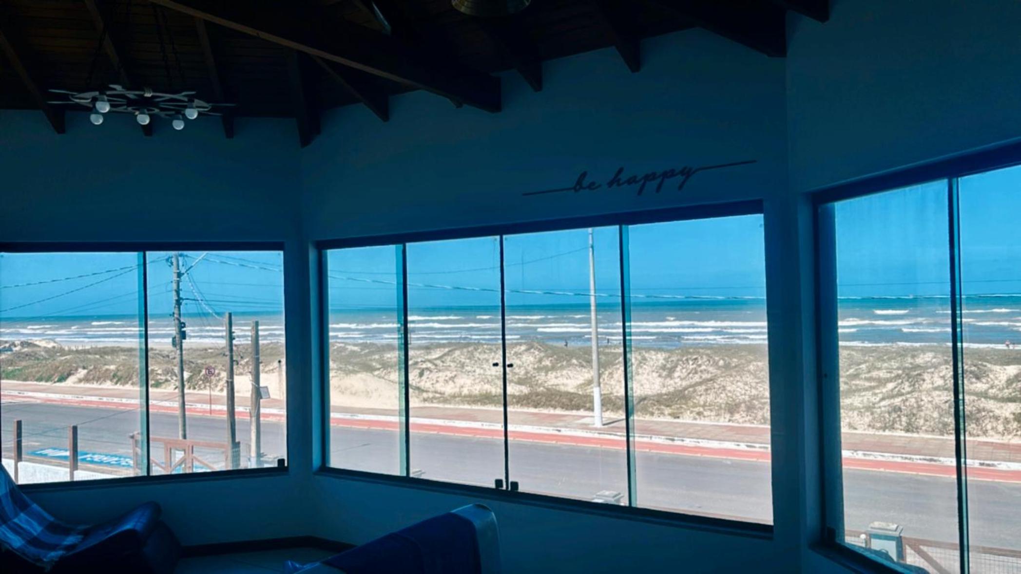 Moradas do Pier 2- apartamento a passos da areia, com vista perfeita da praia e plataforma em Tramandaí!