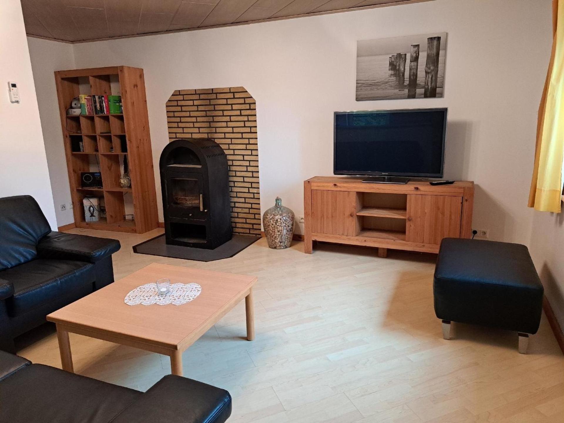 Ferienhaus mit Terrasse mitten im Grünen