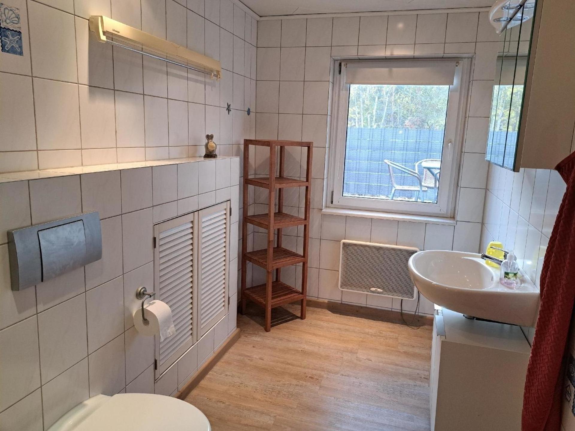 Ferienhaus mit Terrasse mitten im Grünen