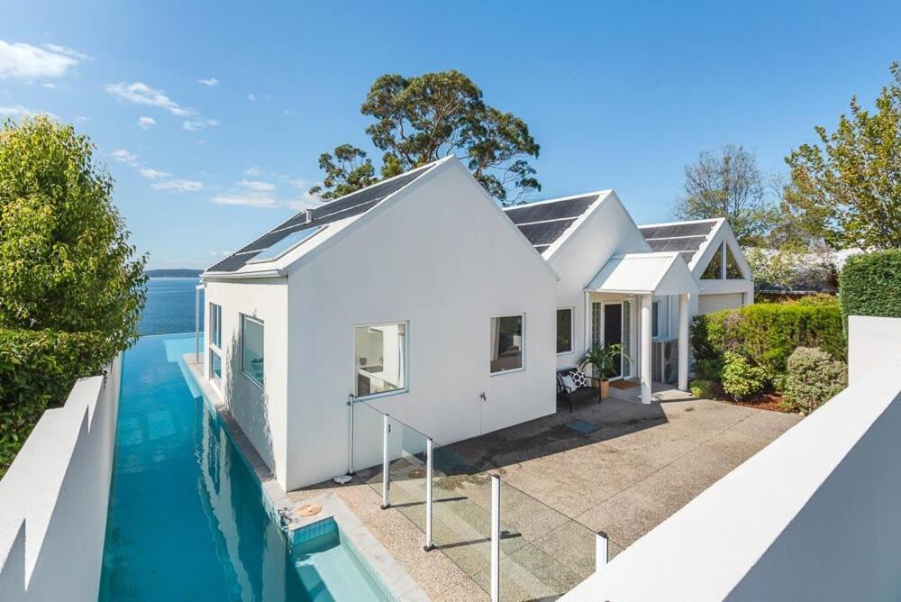 Luxury waterfront home with infinity pool