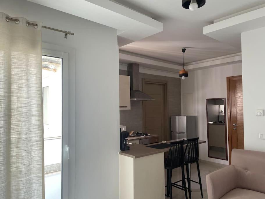 Sweet apartment in Ennasr view 4