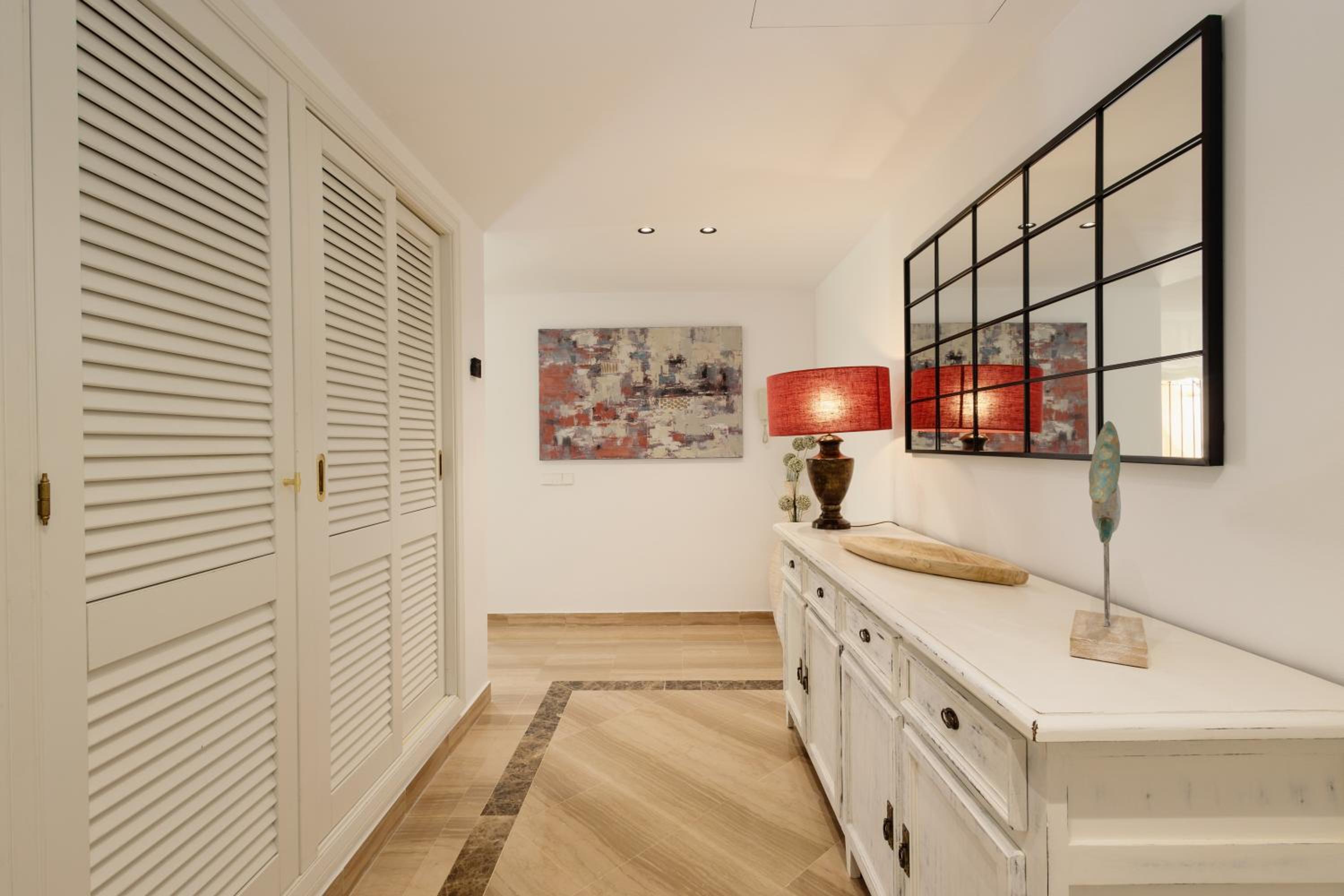 Newly renovated apartment with large private and glazed terrace, close to the beach in Elviria, Marbella East view 2