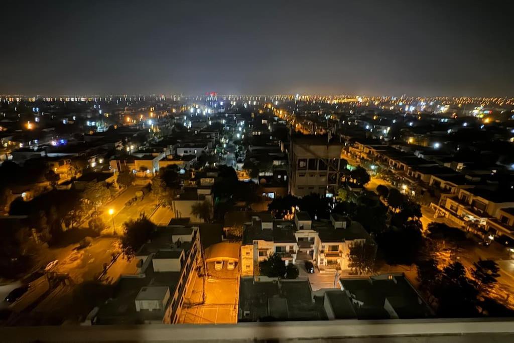 Self Check-in 1 BHK Apt Smart home in DHA Ph 4 with Terrace view 2