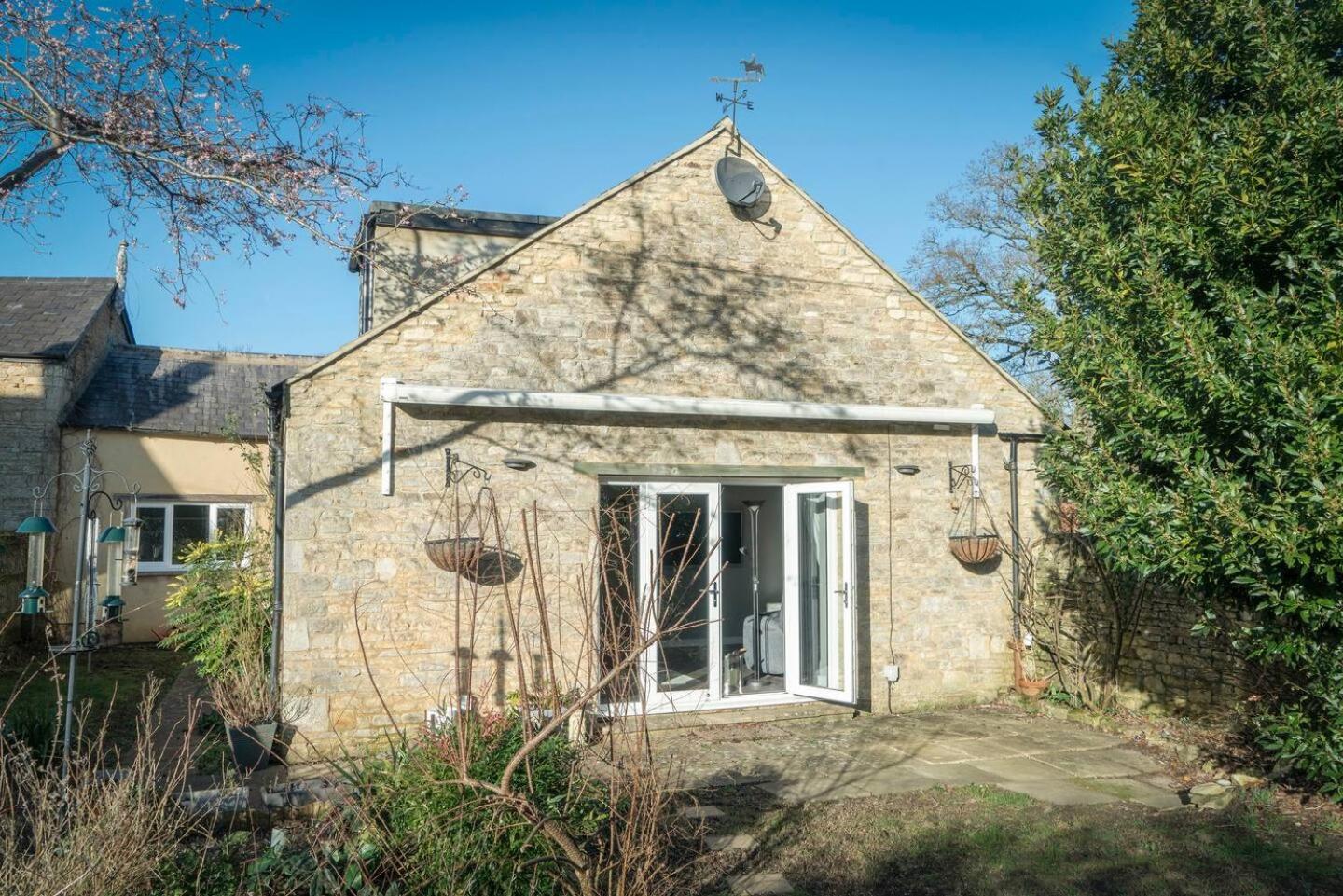 Cottage Nestled In Countryside