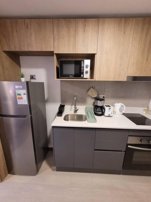 Hermoso departamento tipo Estudio, Cocina y Terraza
