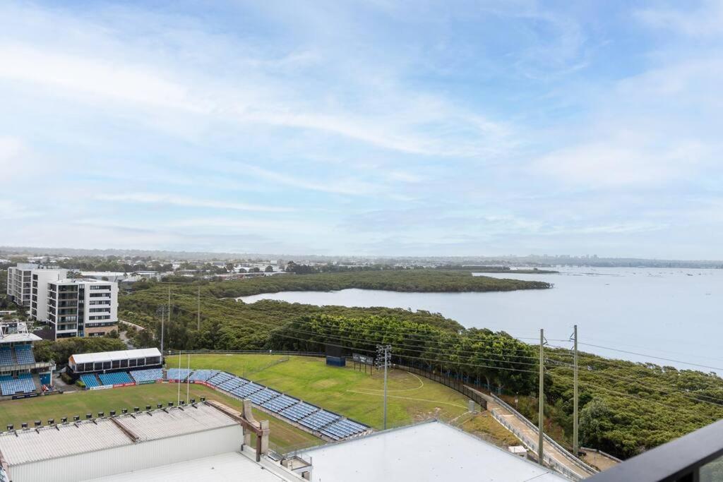 Modern 2BR with Balcony, Pool & Parking