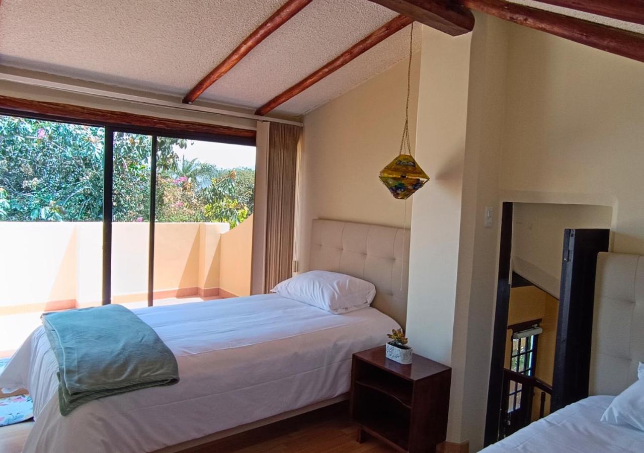 Oasis acogedor en Quito terrazas jardines huerto BBQ wifi estanque