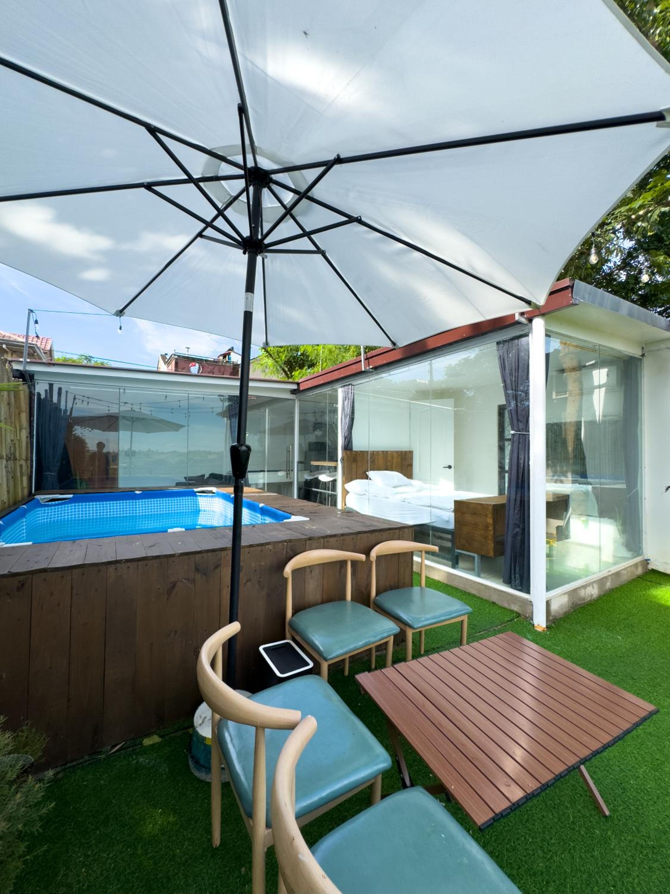 Glass Cabin Secluded Overlooking Oasis with pool view 4