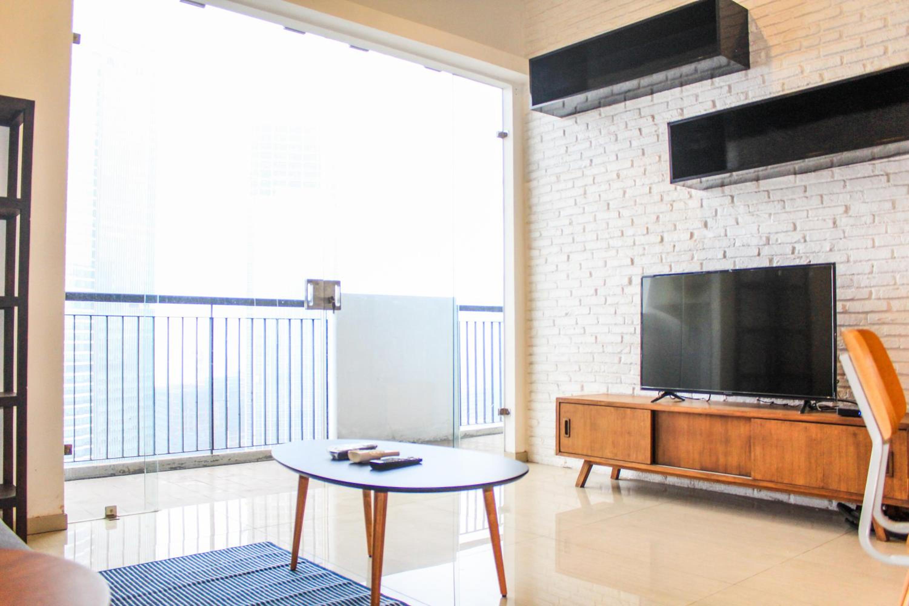 Homey and Warm 3BR Apartment at Ambassade Residences By Travelio