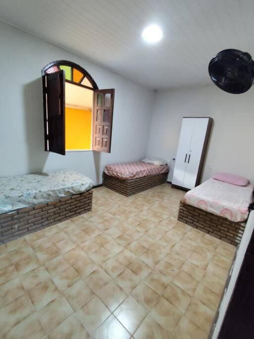 Casa - Ilha Bom J, do Passos