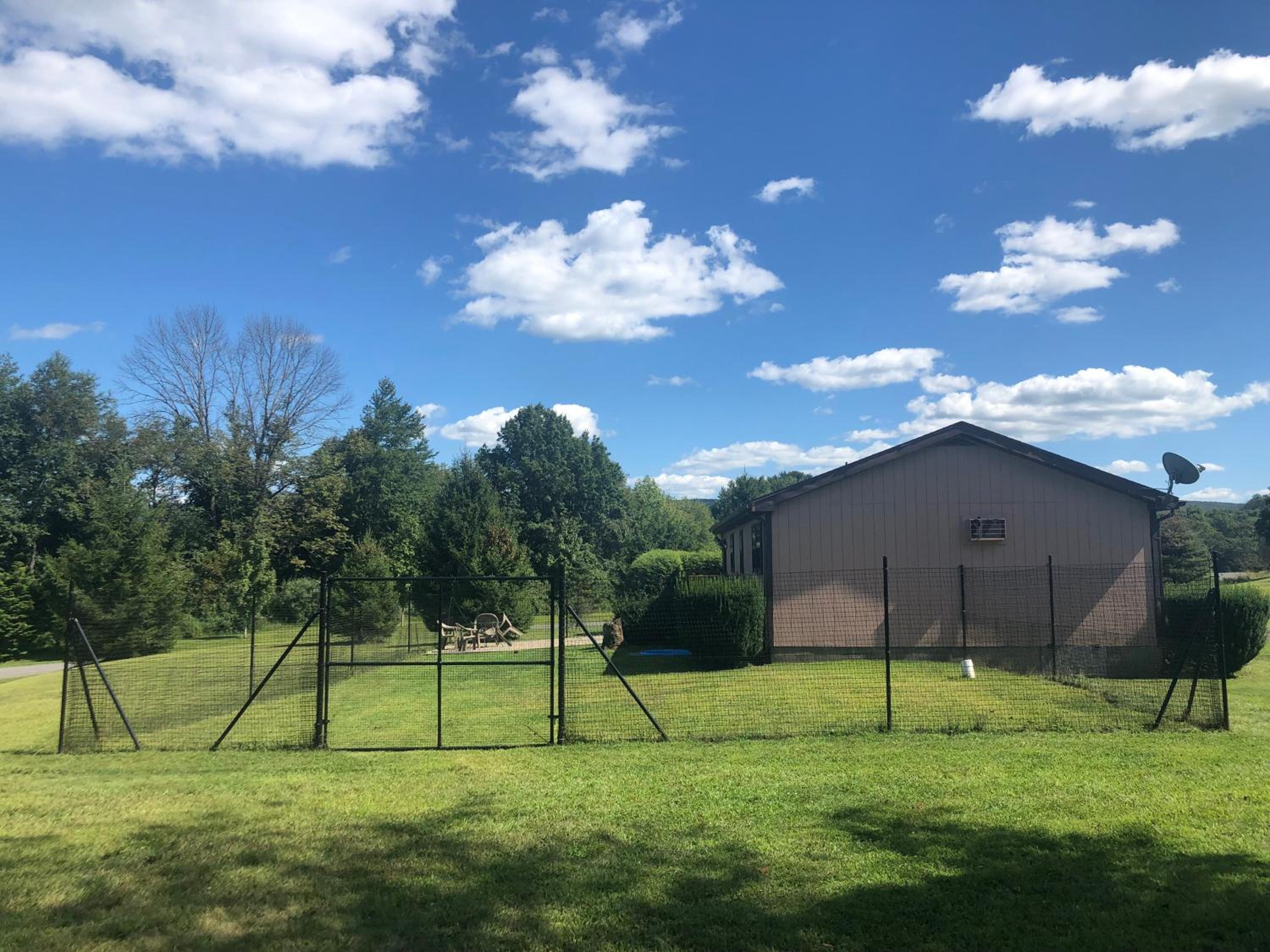 Fenced Yard Chalets from Good Dog Vacations at Big Valley Resort