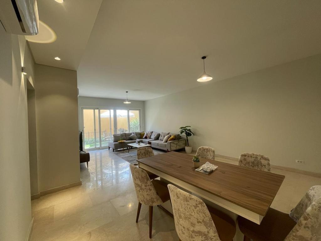 Access-Apartment with garden and shared pool