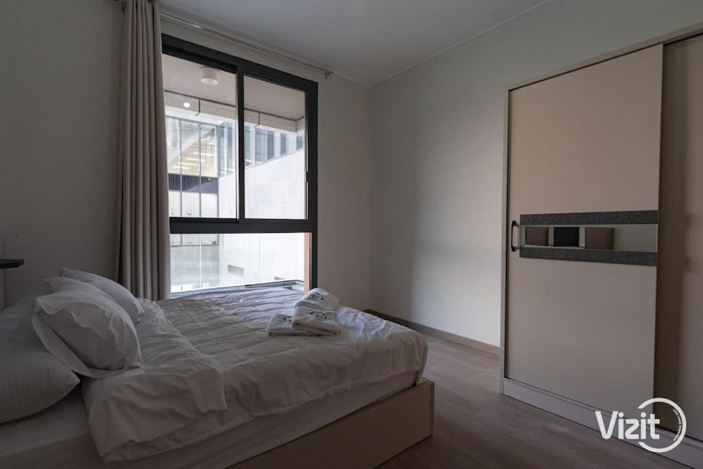 VIZIT 2BR in Aeon Towers