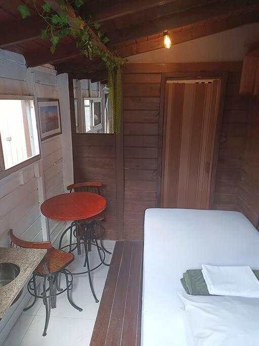 Mini casa pé na areia Campeche