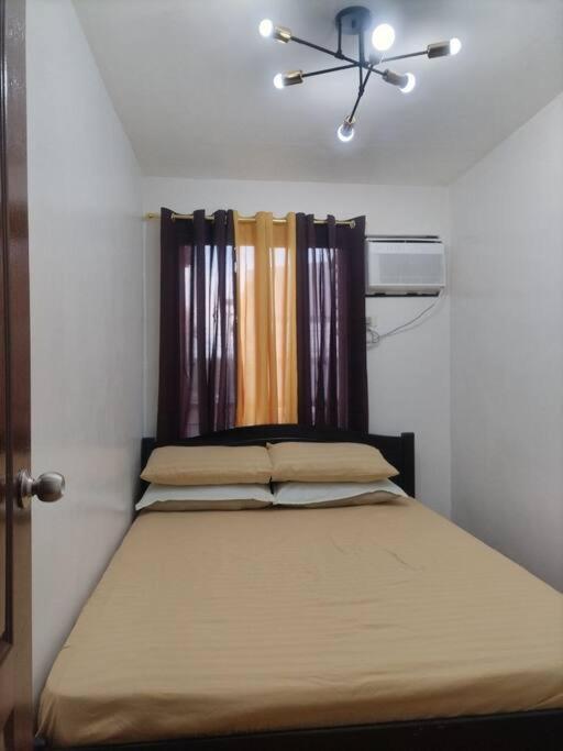 Modern 2BR Condo with Terrace,Netflix,Pool,& WiFi view 5