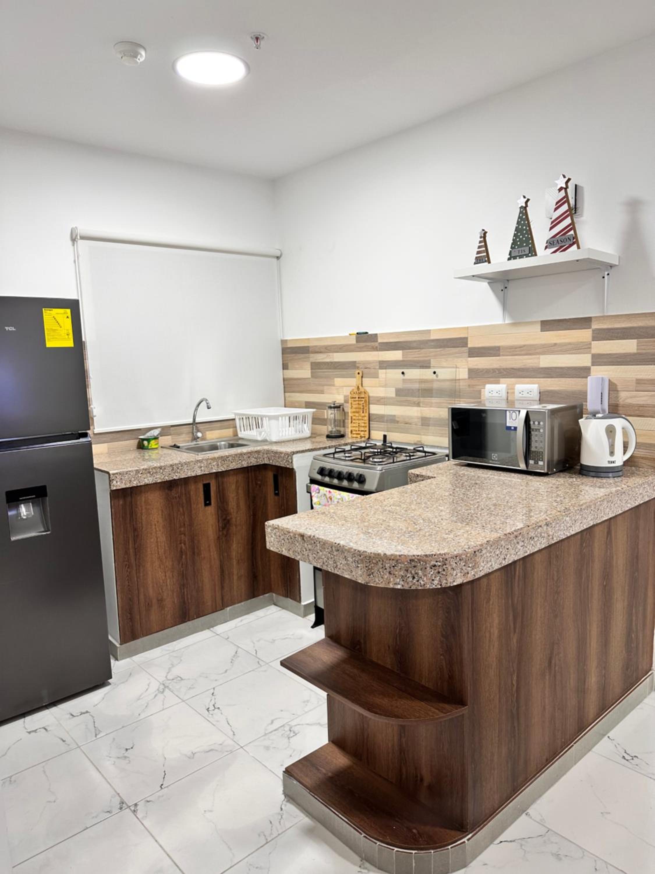 Exclusivo Departamento en vía a la costa, 2 Hab, Parqueo Privado