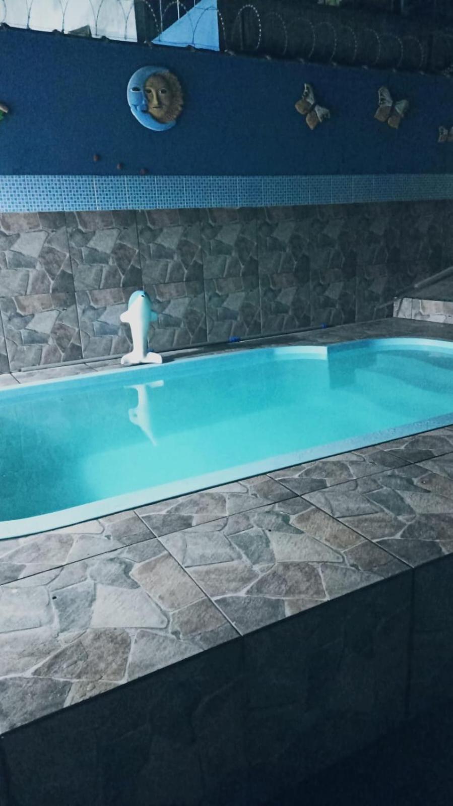 Casa com piscina 3 quartos
