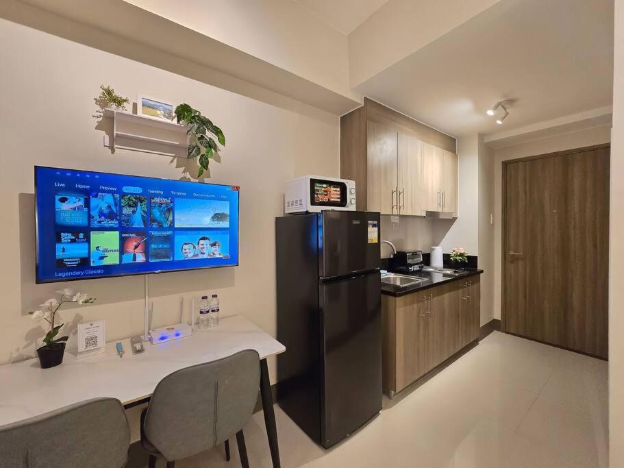 1BR Condotel with Balcony at FAME Residences #FM57 view 2
