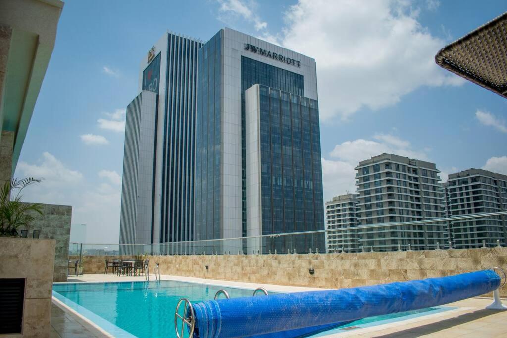 65-inch TV, Westlands Apt, Rooftop Pool, Gym, BBQ view 2