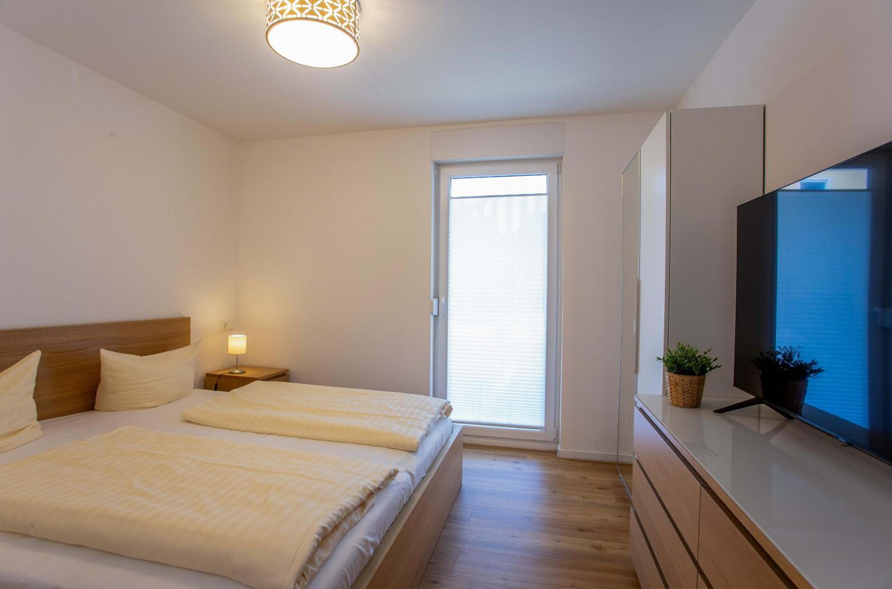Merlin Nest - Komfortable Wohnung mit Terrasse, Garten & Infrarotkabine
