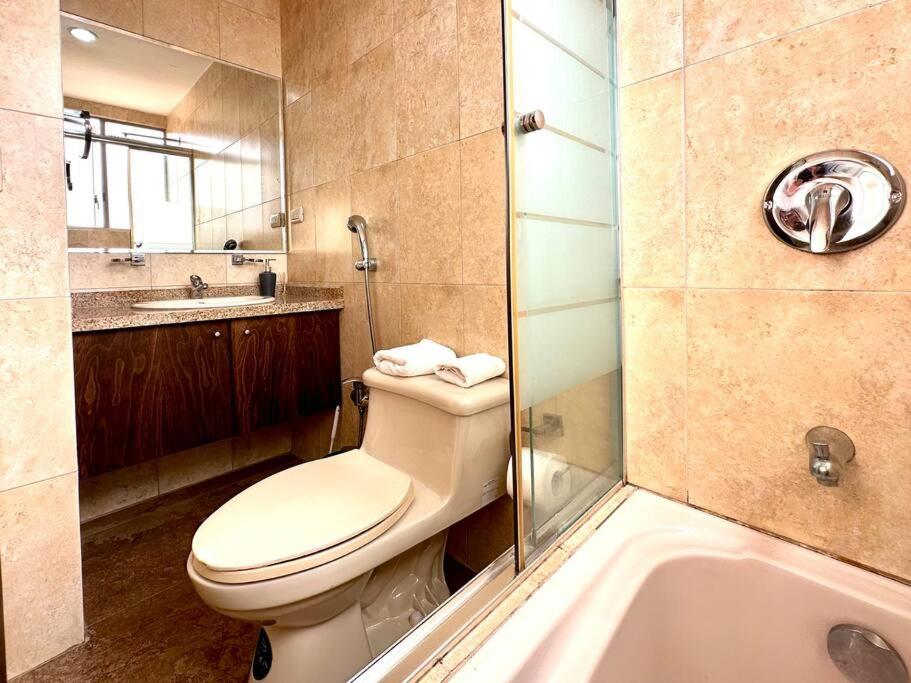 Acogedor apartamento céntrico con 3habitaciones con baño, terraza y 2estacionamientos