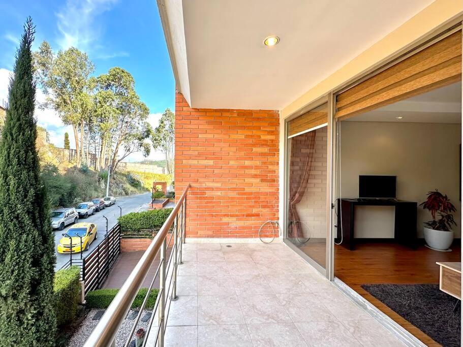 Acogedor apartamento céntrico con 3habitaciones con baño, terraza y 2estacionamientos